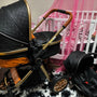 Black 3-in-1 baby stroller for modern parents