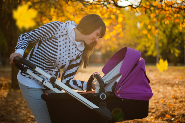 mom with baby stroller
