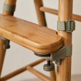 Close-up of secure clamp and strap hardware on the footrest