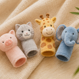Close-up of four soft animal finger puppets