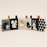 High-contrast fold-out cloth activity book