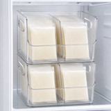 Two breastmilk freezer organizers stacked on a stable freezer shelf