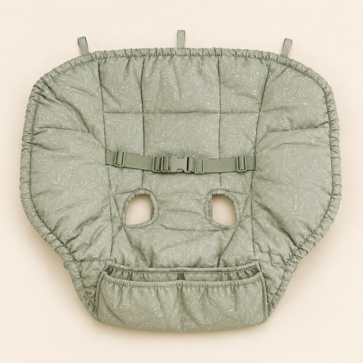 Quilted sage leaf shopping cart and high chair cover spread flat