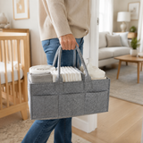 Empty oatmeal gray diaper caddy showing adjustable compartments and pockets