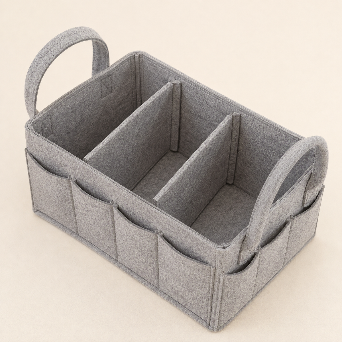 Portable diaper caddy carried between rooms for baby-care routines