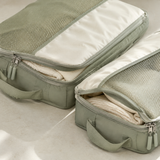 Close-up of packing cube mesh zippers seams and carry handles