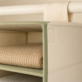 Close-up of reinforced sage trim and wide hanging strap