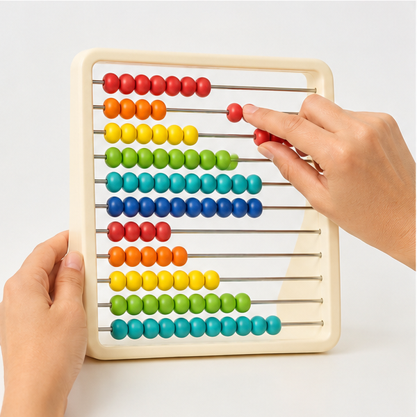 Adult hands sliding beads on the counting abacus