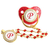 Red and gold initial P pacifier with matching decorative clip
