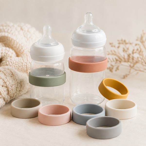 Eight muted rainbow silicone identification bands with baby bottles