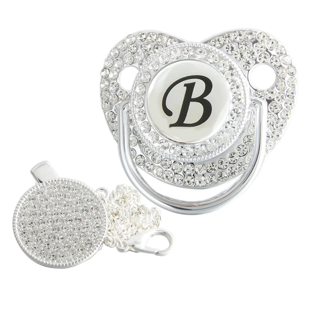 Silver initial B bling pacifier with matching round decorative clip