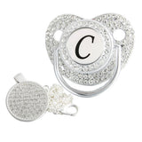 Silver initial C bling pacifier with matching round decorative clip
