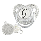 Silver initial G bling pacifier with matching round decorative clip