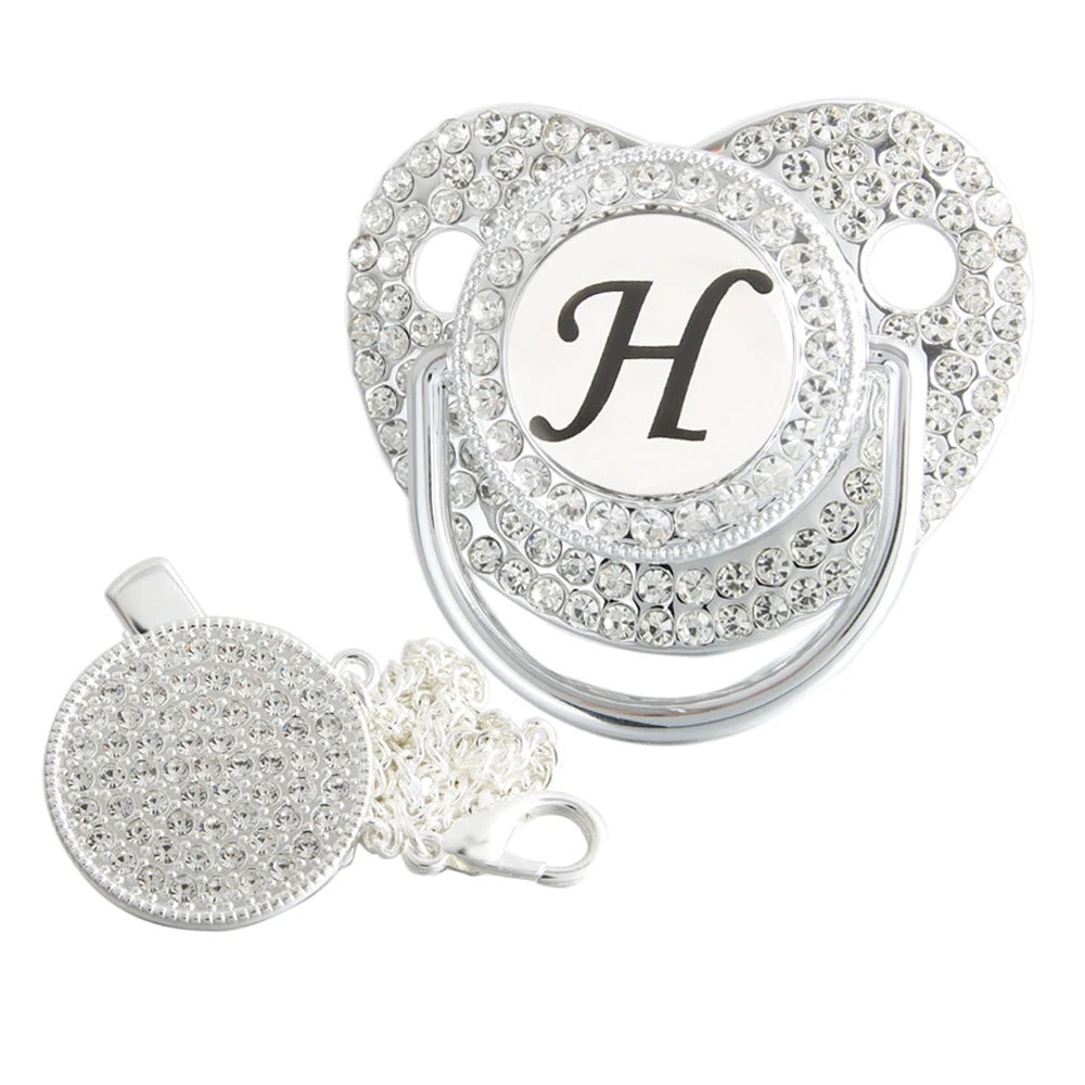 Silver initial H bling pacifier with matching round decorative clip