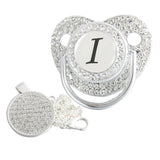 Silver initial I bling pacifier with matching round decorative clip