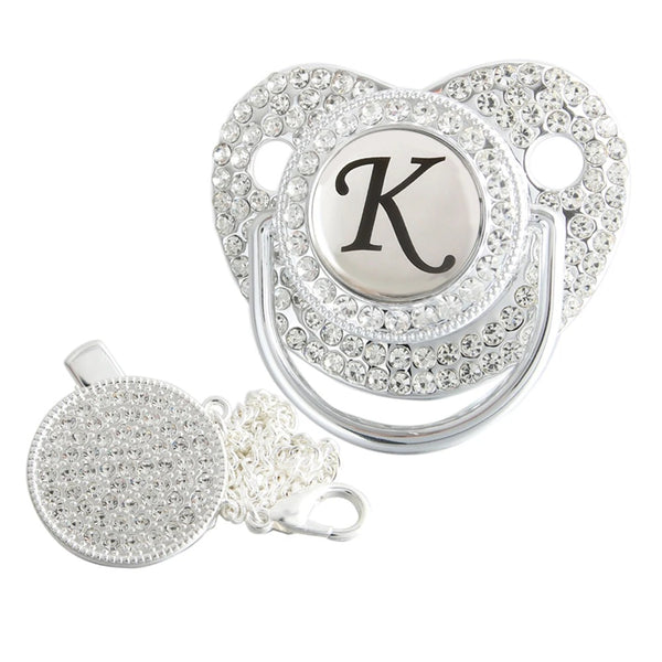 Silver initial K bling pacifier with matching round decorative clip