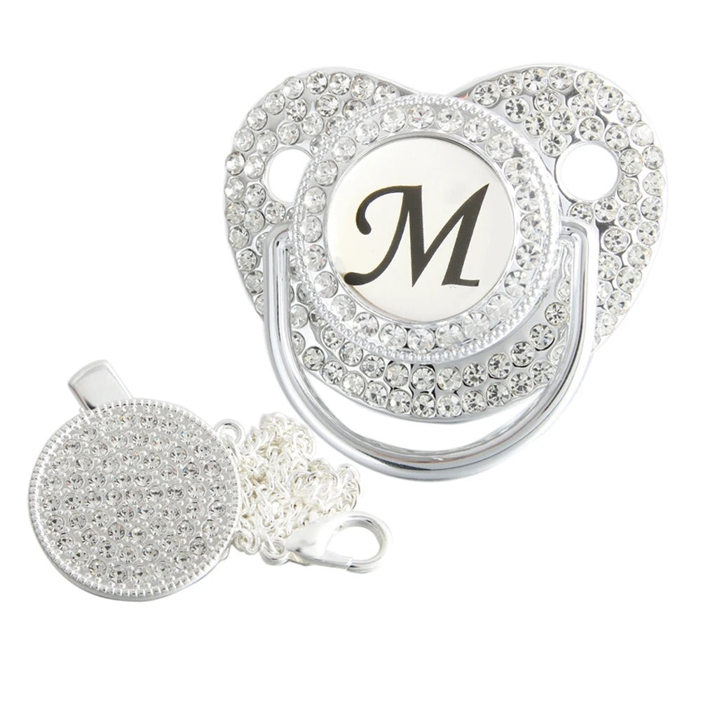 Silver initial M bling pacifier with matching round decorative clip