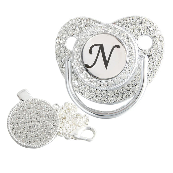 Silver initial N bling pacifier with matching round decorative clip