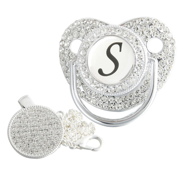 Silver initial S bling pacifier with matching round decorative clip