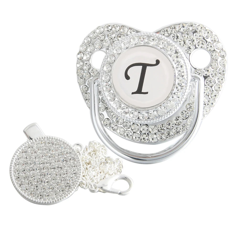 Silver initial T bling pacifier with matching round decorative clip