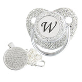 Silver initial W bling pacifier with matching round decorative clip
