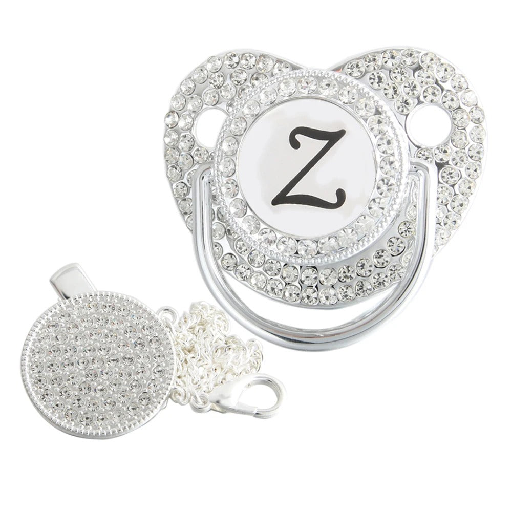 Silver initial Z bling pacifier with matching round decorative clip