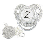 Silver initial Z bling pacifier with matching round decorative clip