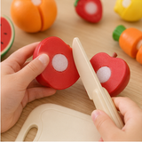 Hook-and-loop pretend apple and child-safe toy knife detail