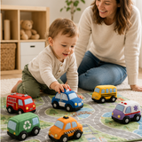 Toddler playing with six soft vehicles under adult supervision