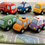 Close view of soft fabric vehicles and rounded wheelbases