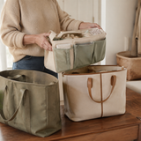 Adult moving the organized insert between two tote bags