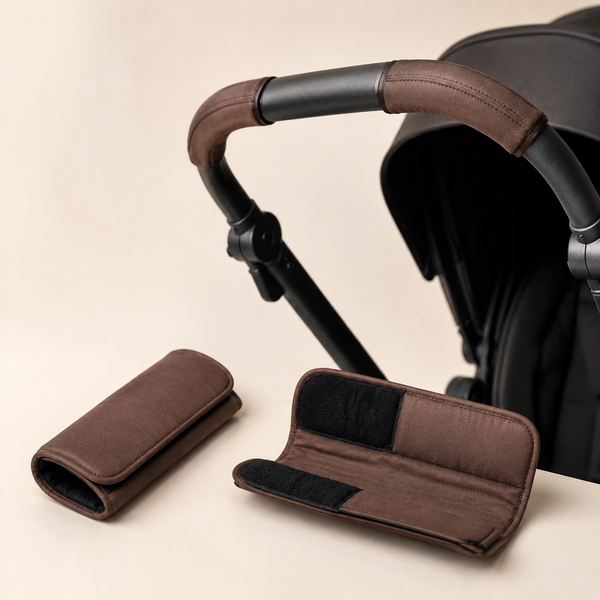 Pair of cocoa stroller handle grip covers shown open and installed