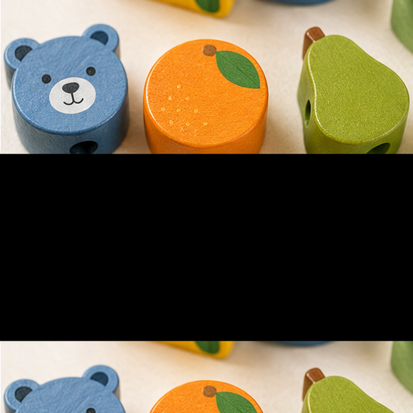 Close-up of colorful fruit and animal wooden lacing beads